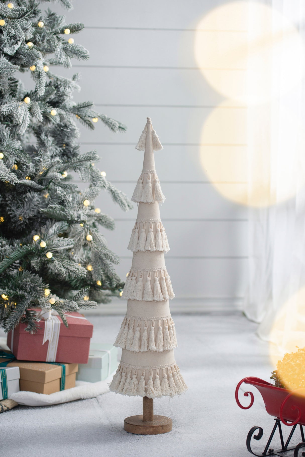 Fringes Embellished Cone With Wooden Base