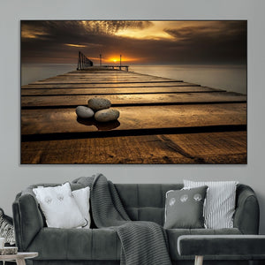 Stones on Wooden Pier at Sunset Canvas Print, Serene Coastal