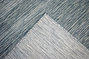 Solid Blue and Silver Wool And Viscose 5x8 Area Rug