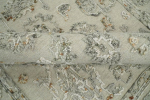 Hand Tufted Beige and Silver Wool Textured Loop 5x8 Area Rug