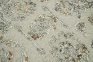Hand Tufted Beige and Silver Wool Textured Loop 5x8 Area Rug
