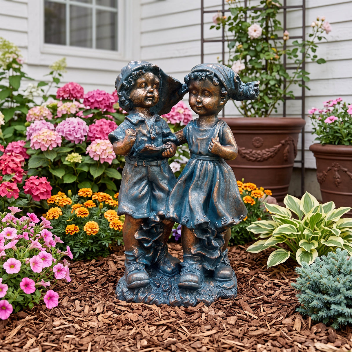 Magnesium Oxide Statues Of A Boy And A Girl