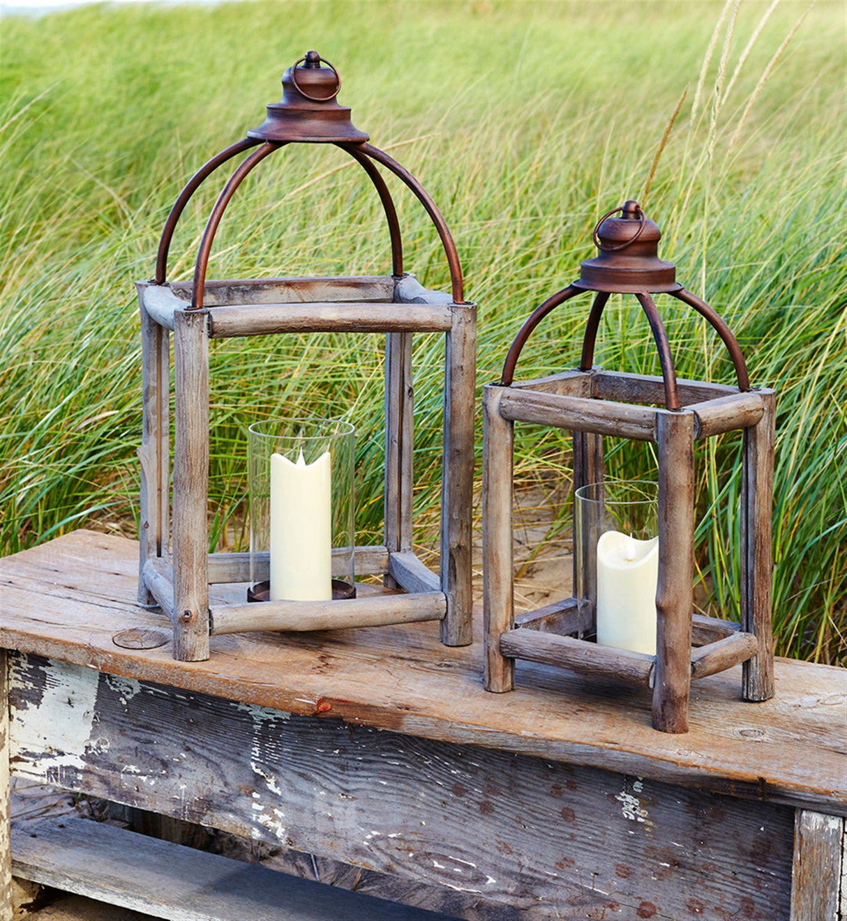 Rustic wood log and antique metal lantern with glass hurricane (set of 2)