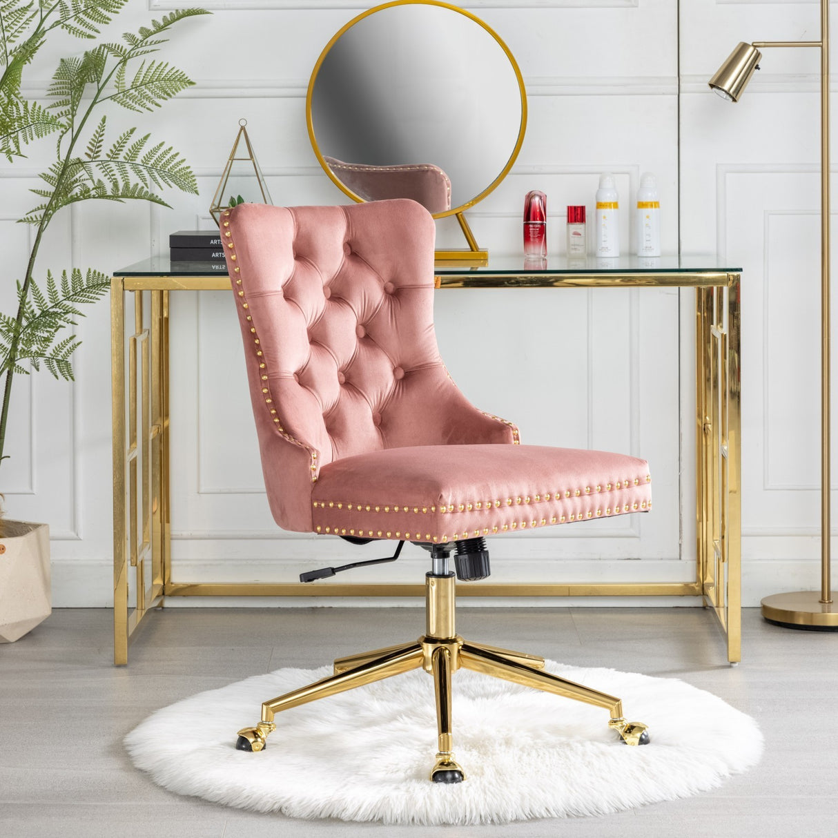 Velvet upholstered tufted chair with golden metal adjustable swivel base