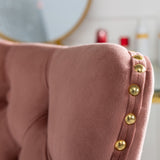 Velvet upholstered tufted chair with golden metal adjustable swivel base