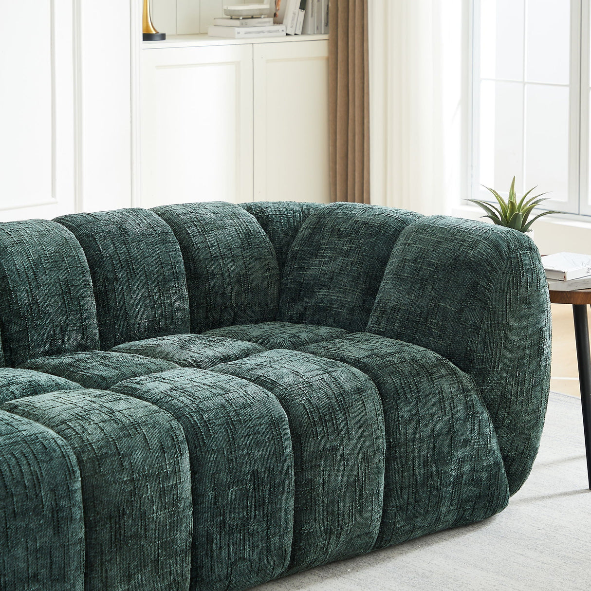 Quilted Cloud Sofa With Rounded Armrests And Piano Key Backrest Design