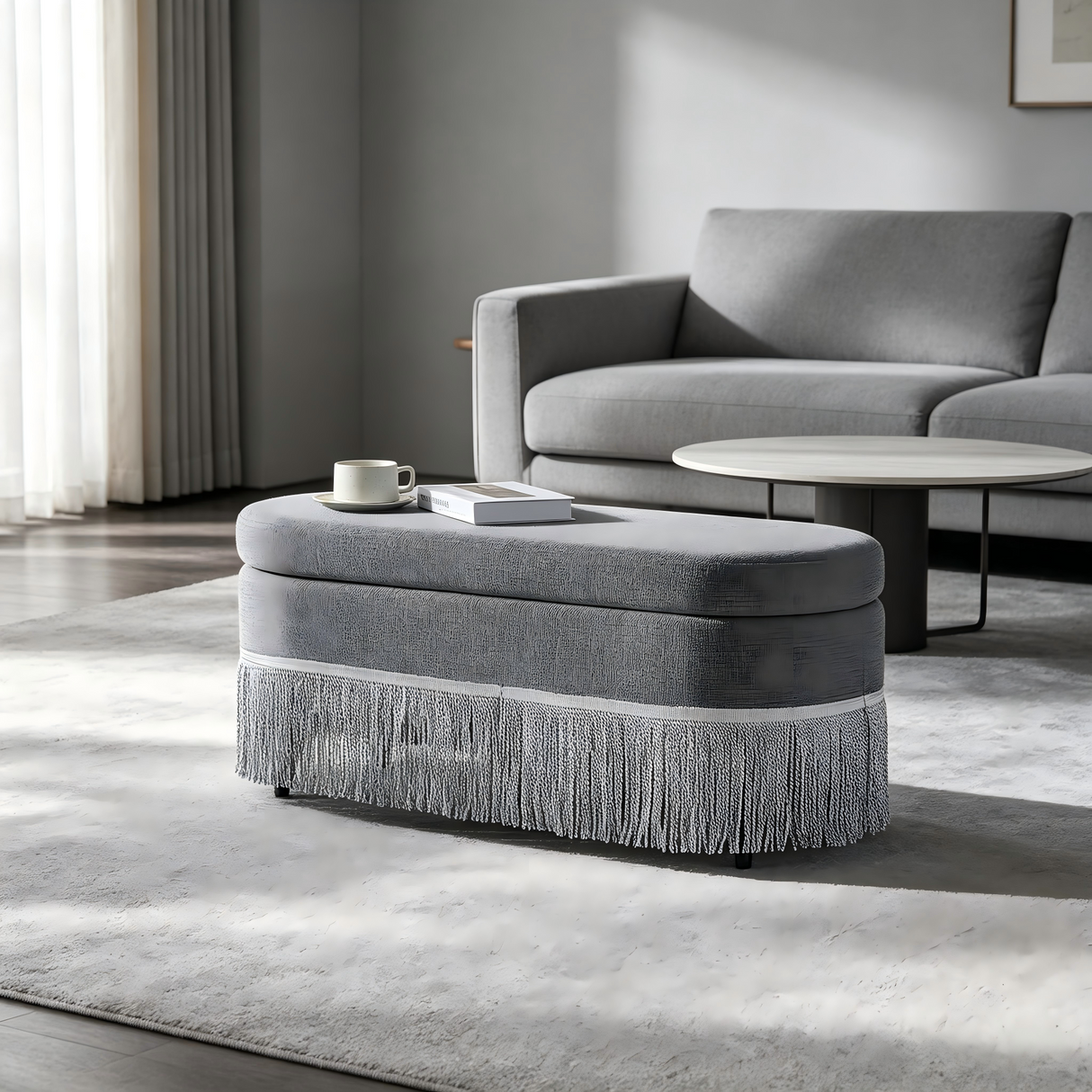 Oval Upholstered Storage Ottoman with Fringe Trim