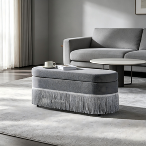 Oval Upholstered Storage Ottoman with Fringe Trim