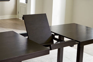 Neymorton - 7 Pc. - Rectangular Extension Table, 6 Side Chairs - Dark Grayish Brown