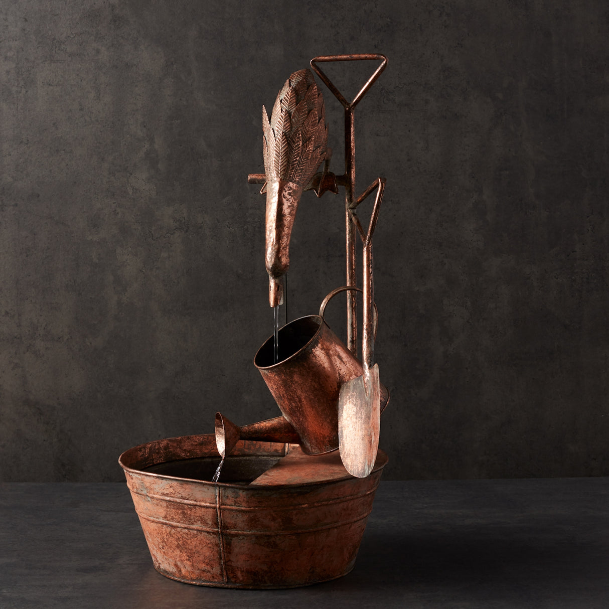 Rustic metal fountain with duck and watering can 33"h