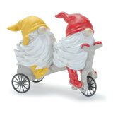 Whimsical garden gnome figurine riding a scooter and wheelbarrow (set of 2)