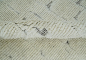 8x10 carved pattern Beige and Gray hand knotted wool rug