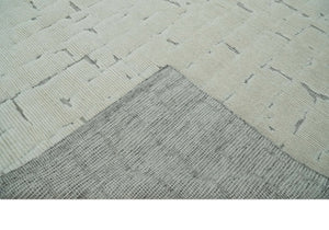 8x10 carved pattern Beige and Gray hand knotted wool rug