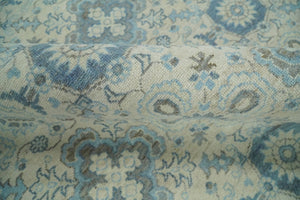 Hand Knotted Traditional Ivory and Blue Oxidized Textured Low Pile Wool Rug