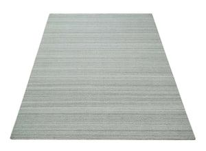 8x10 Hand Made Solid Ivory and Brown Blended Wool Flatwoven Area Rug