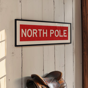 Framed North Pole Red Christmas Art Print