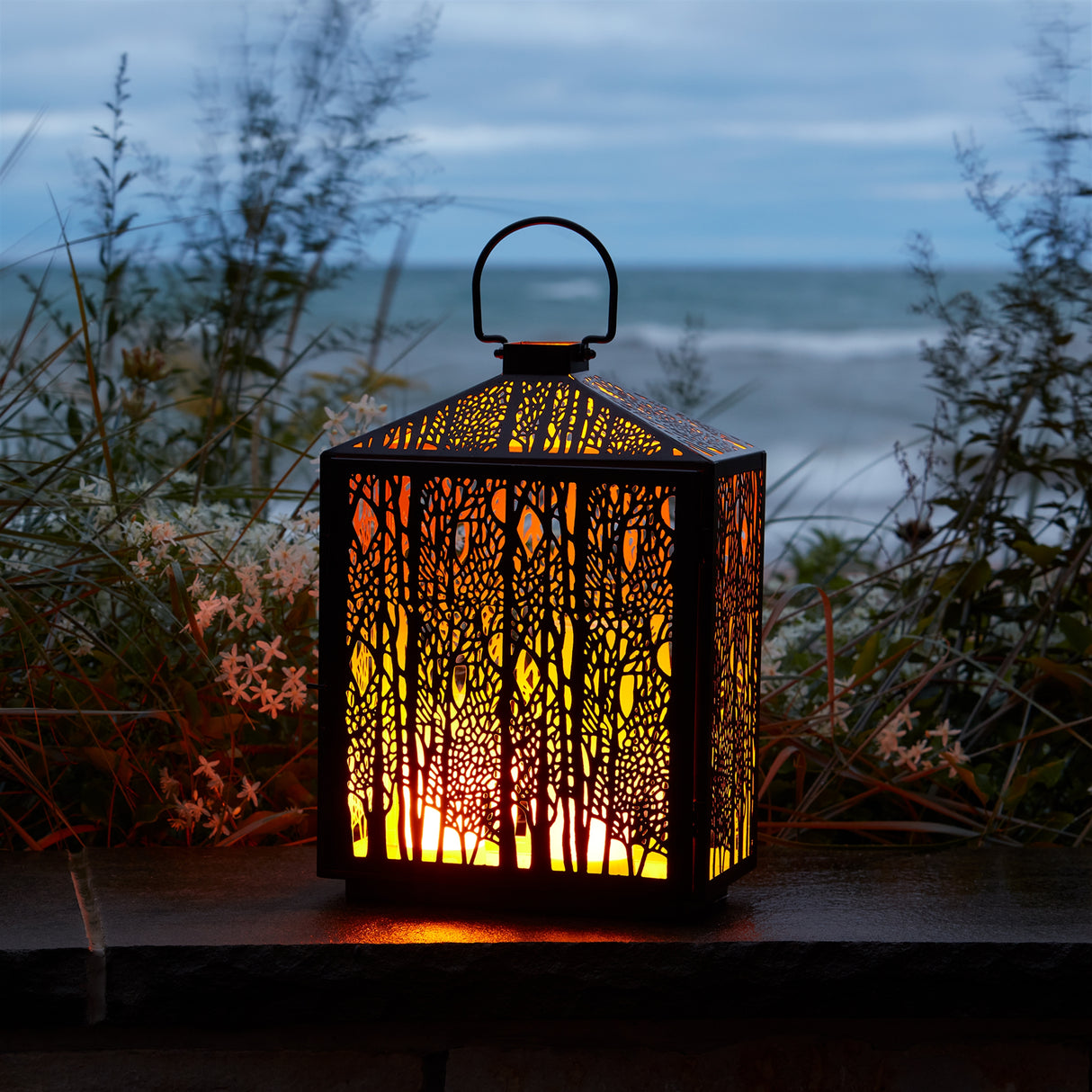 Forest cut metal lantern with gold accent 16"h