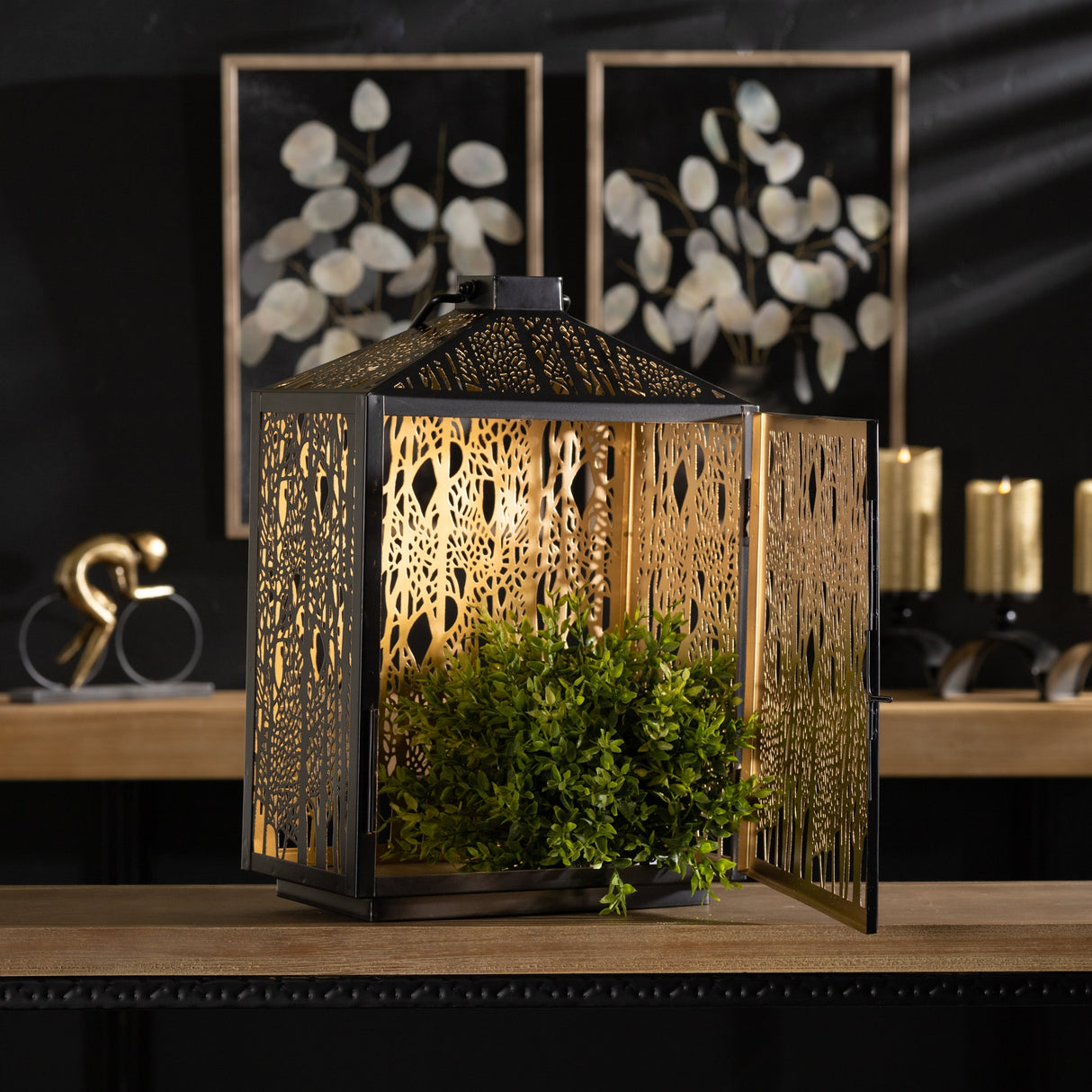 Forest cut metal lantern with gold accent 16"h
