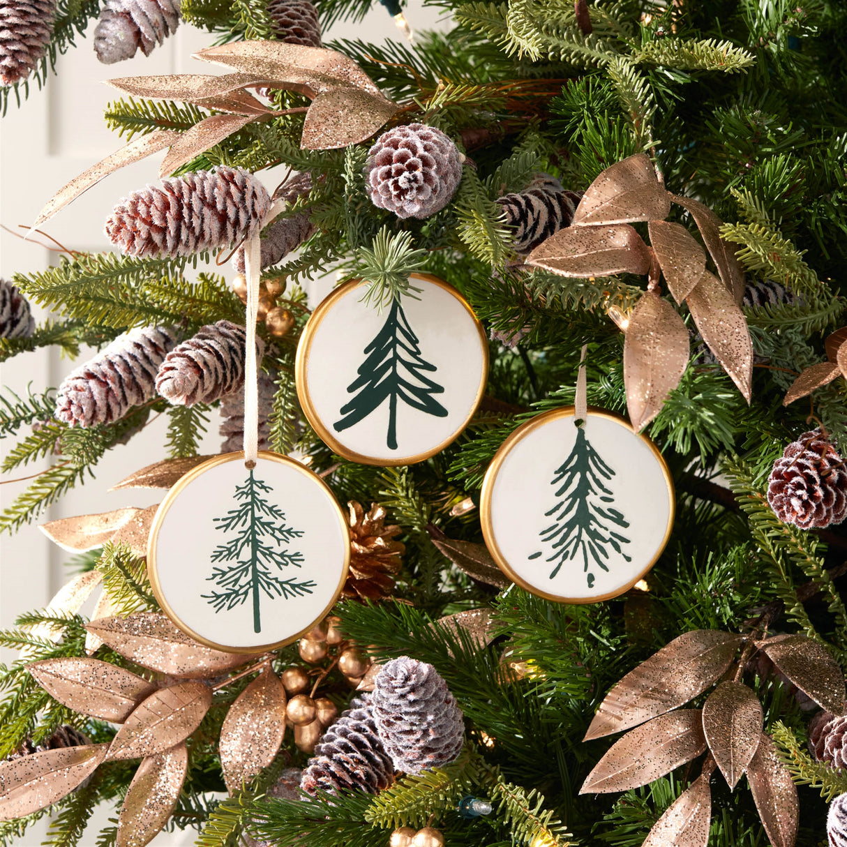 Ceramic pine tree disc ornament (set of 12)