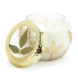 Frosted juniper scented soy candle with pressed leaf lid 5"d