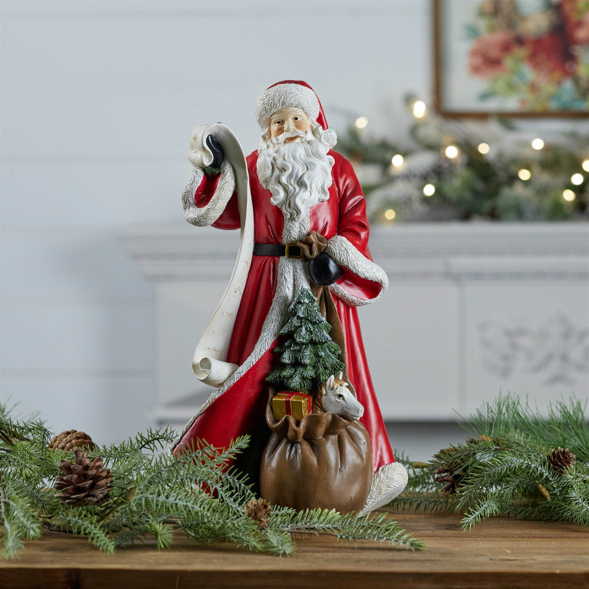 Santa with list statue 16"h