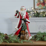 Santa with list statue 16"h