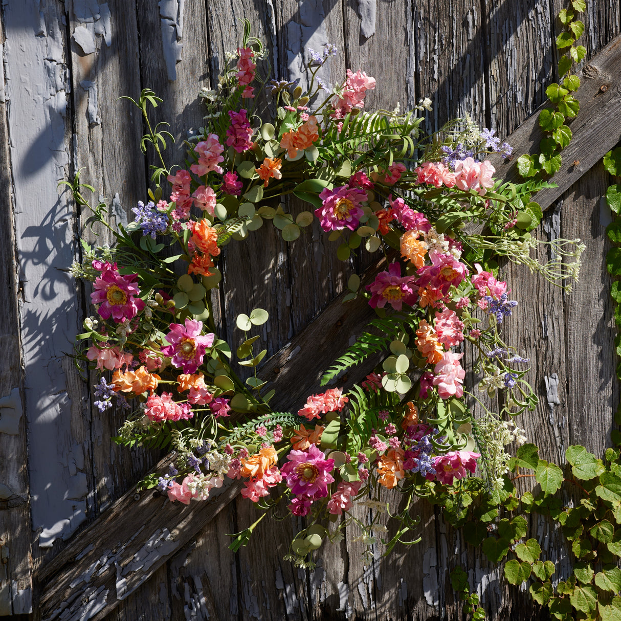 Mixed floral and foliage wreath 20"d