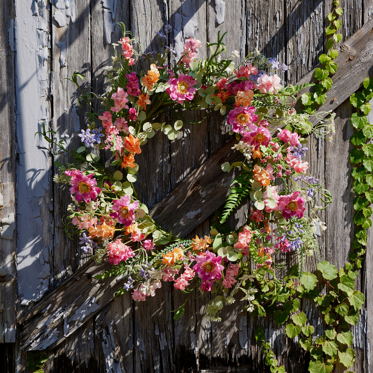 Mixed floral and foliage wreath 20"d