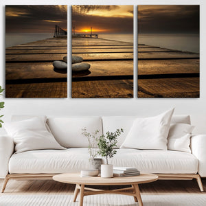 Stones on Wooden Pier at Sunset Canvas Print, Serene Coastal