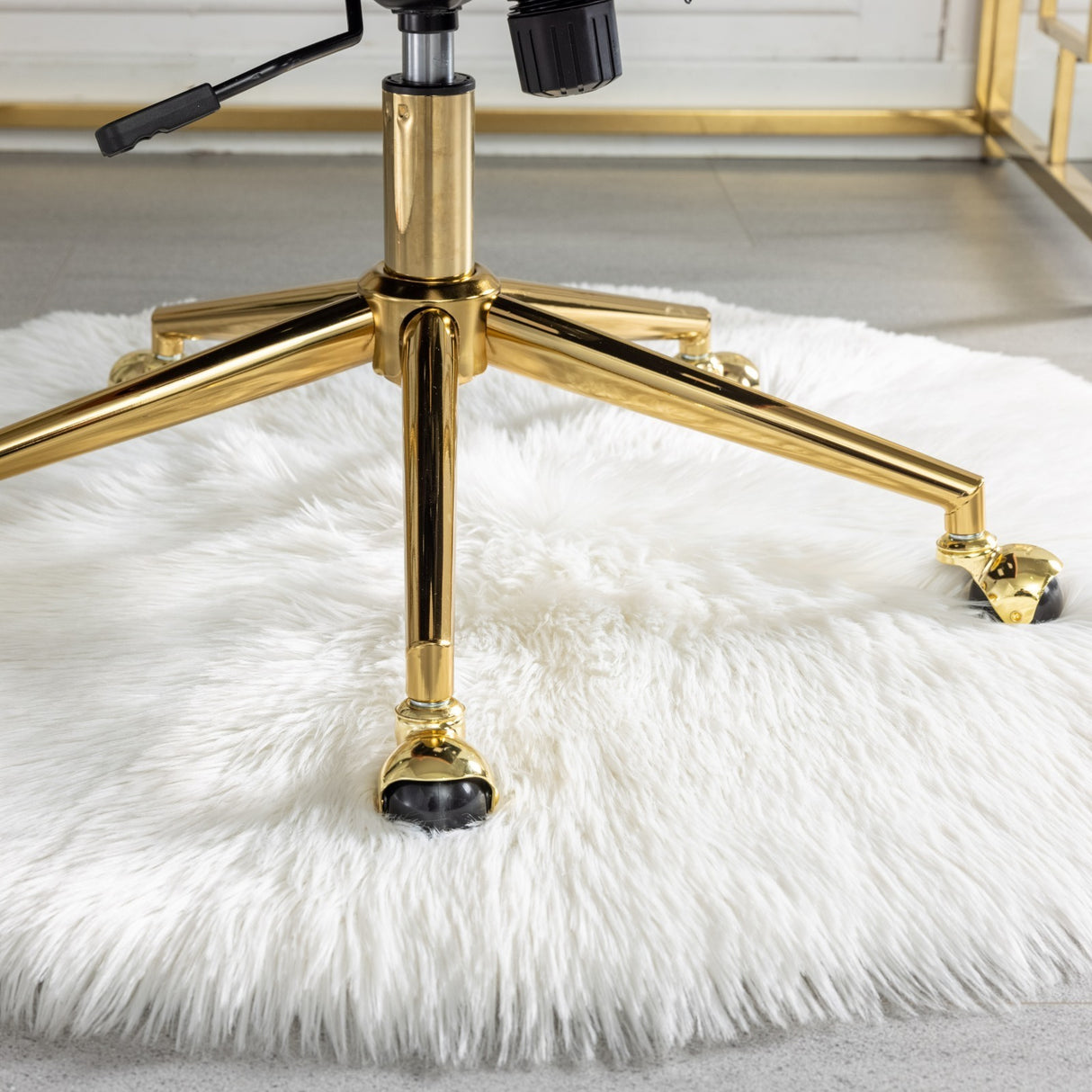 Velvet upholstered tufted chair with golden metal adjustable swivel base