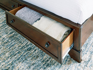 Trellington - Queen Sleigh Storage Bed - Brown