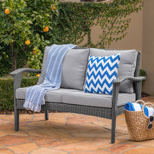 The Contoured All-Weather Wicker Loveseat by Christopher Knight Home