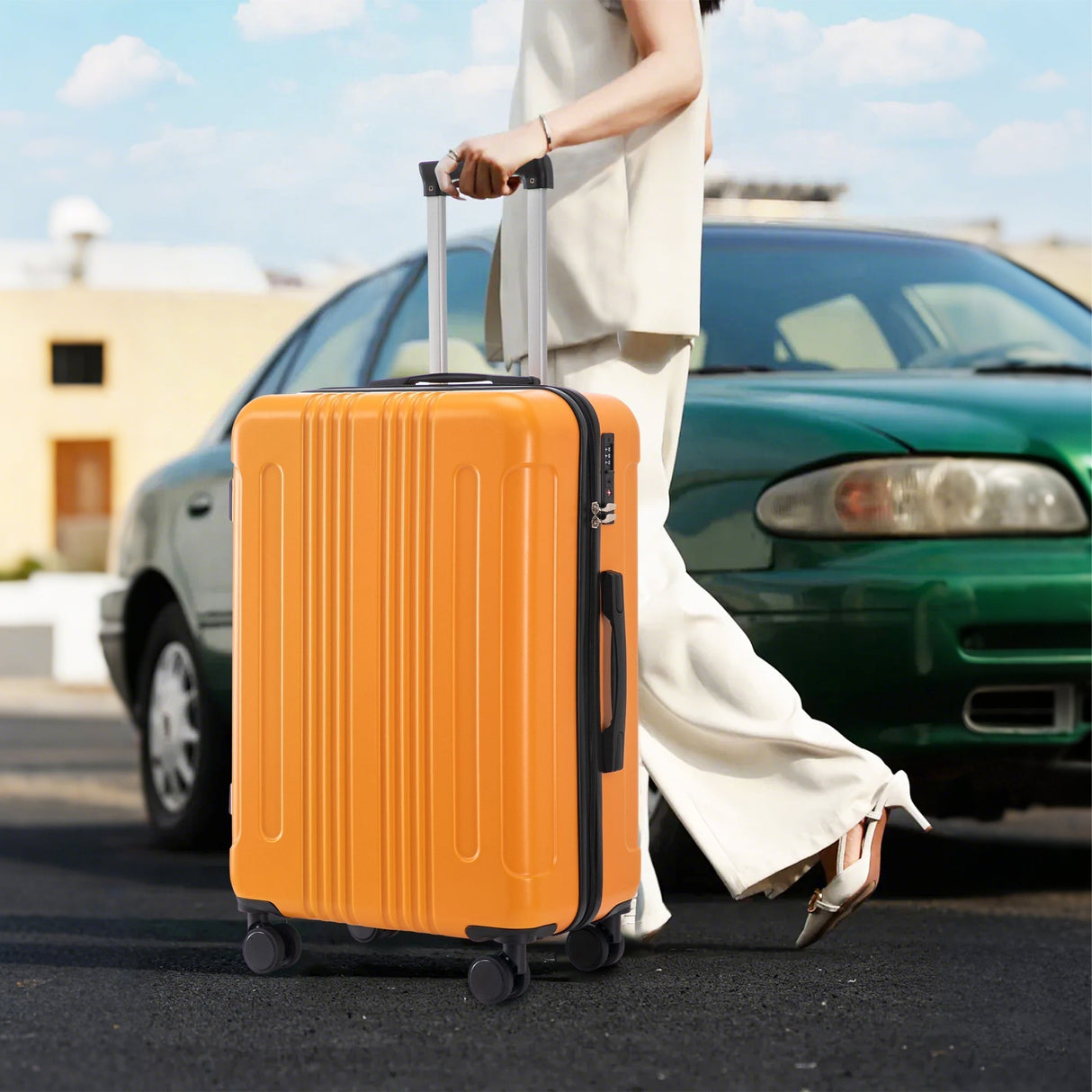 3-Piece ABS Spinner Wheel Luggage Set in Black and Orange