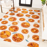 Aranciata citrus slice high-low indoor/outdoor area rug
