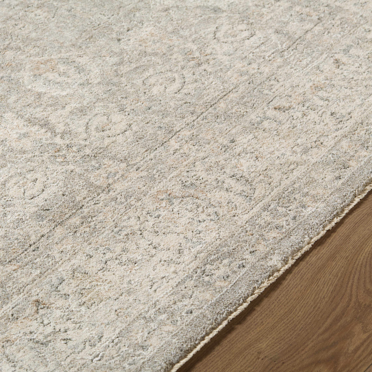 Buddug Cream Area Rug