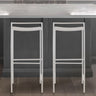 Svelte Coastal Contemporary Iron Saddle-Seat Low-Back Bar Stool with Foot Rest