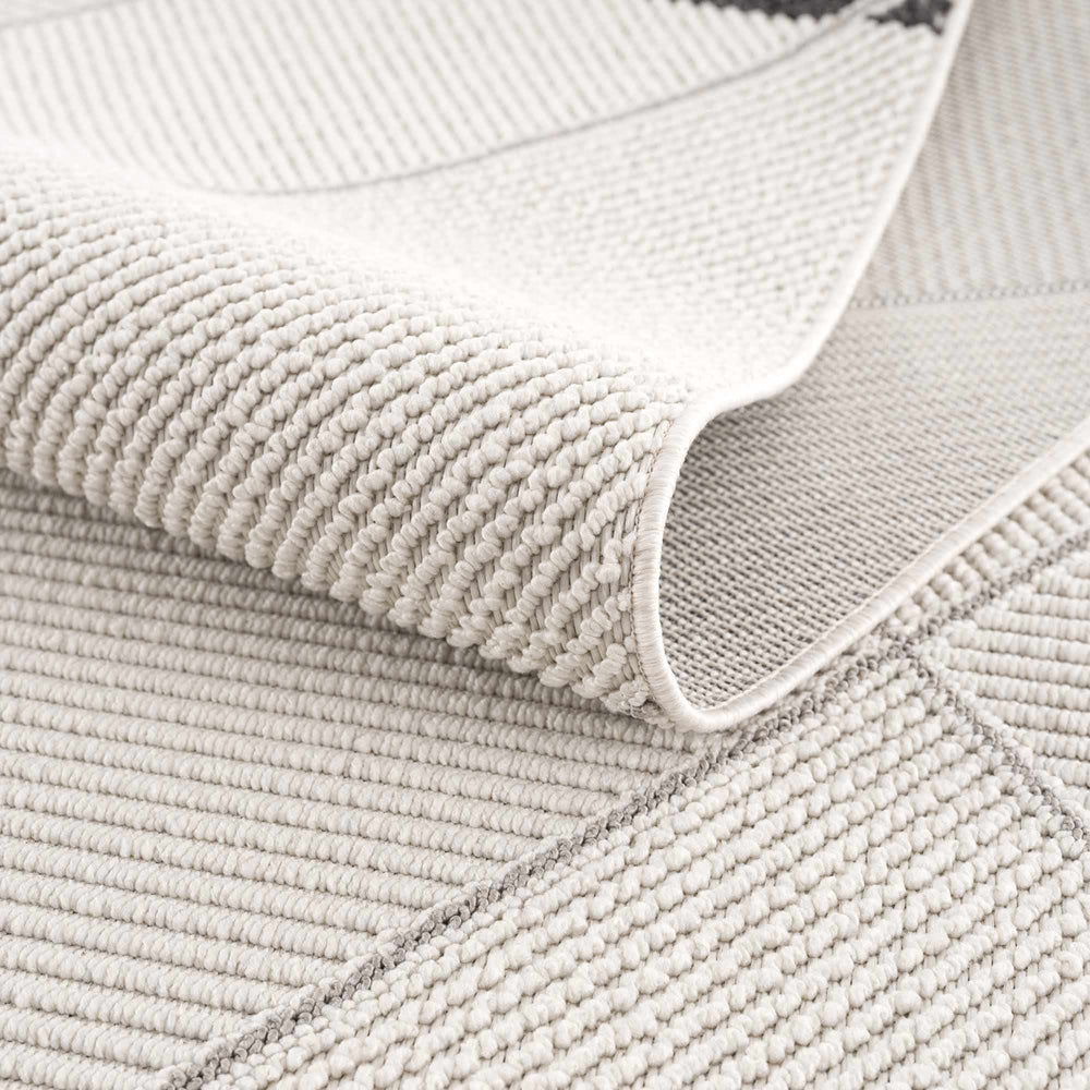Tale Area Rug