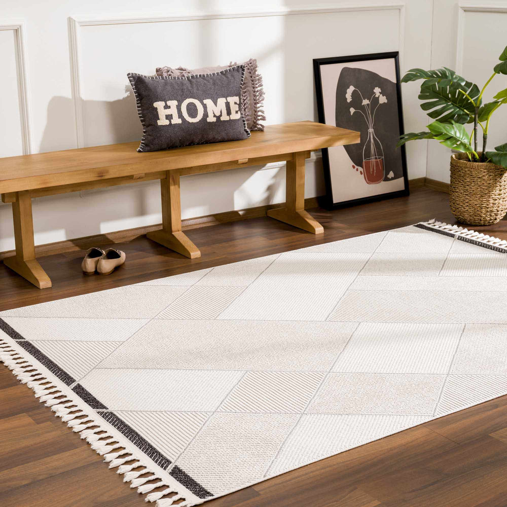 Tale Area Rug