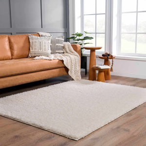 Faina Solid Cream Shag Washable Area Rug - Clearance