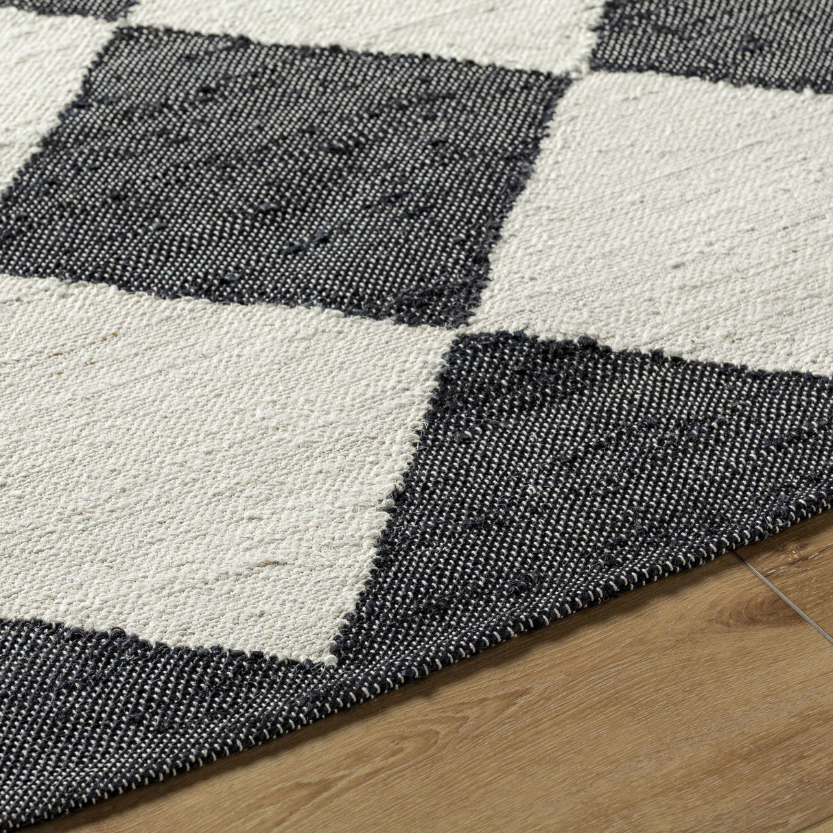 Andrin Black Area Rug