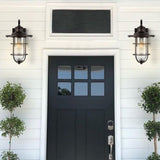 Westfield 1-Light Iron/Seeded Glass Rustic Industrial Cage LED Outdoor Sconce