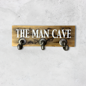 Man cave pipe hook wall art
