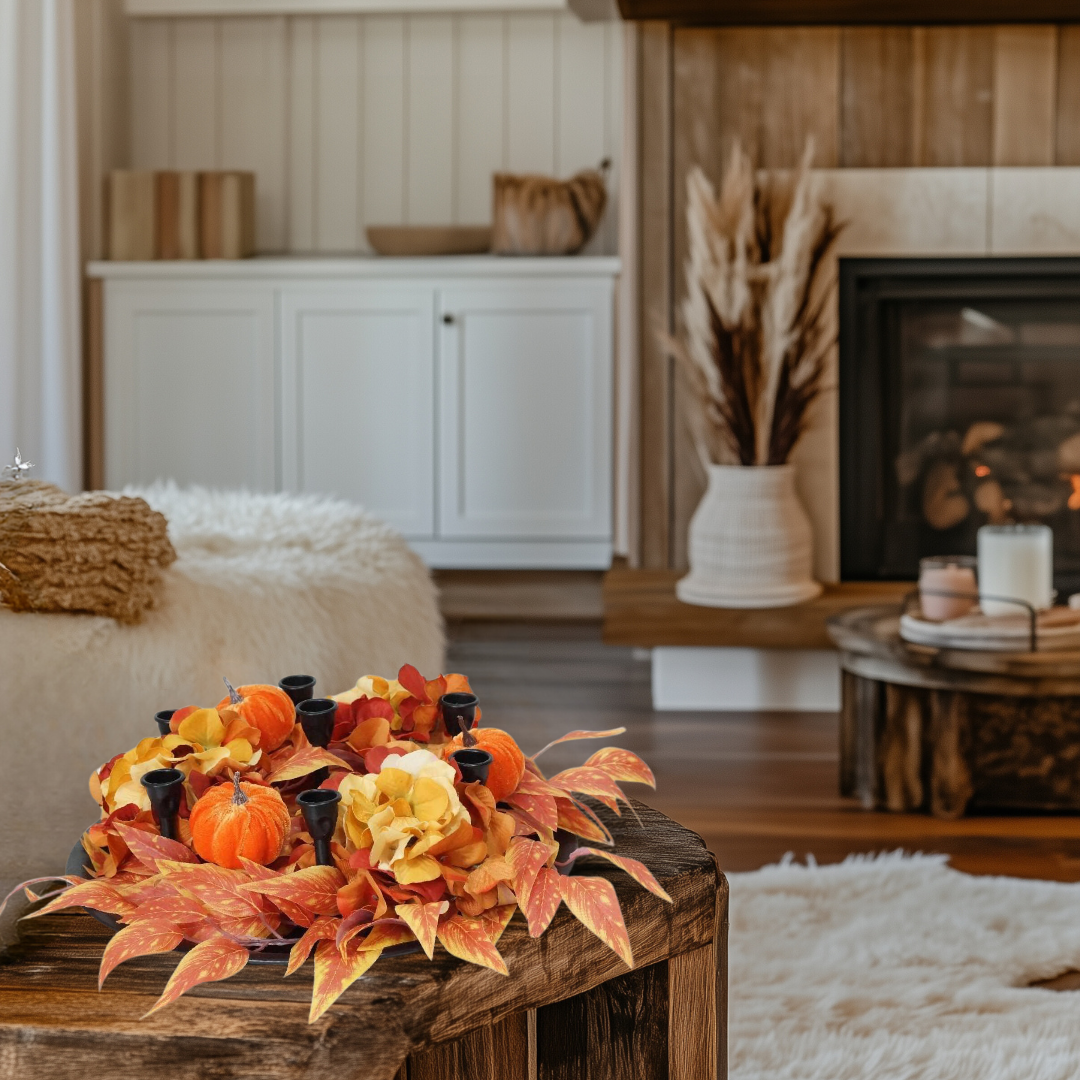 Harvest pumpkin and floral candle holder centerpiece