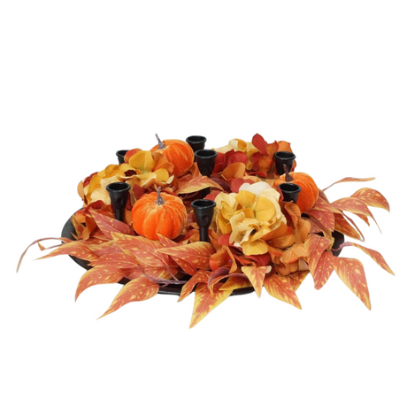 Harvest pumpkin and floral candle holder centerpiece