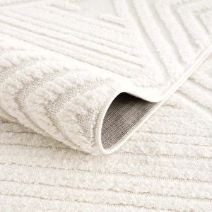 Manyas 3D Bone Area Rug with Tassels