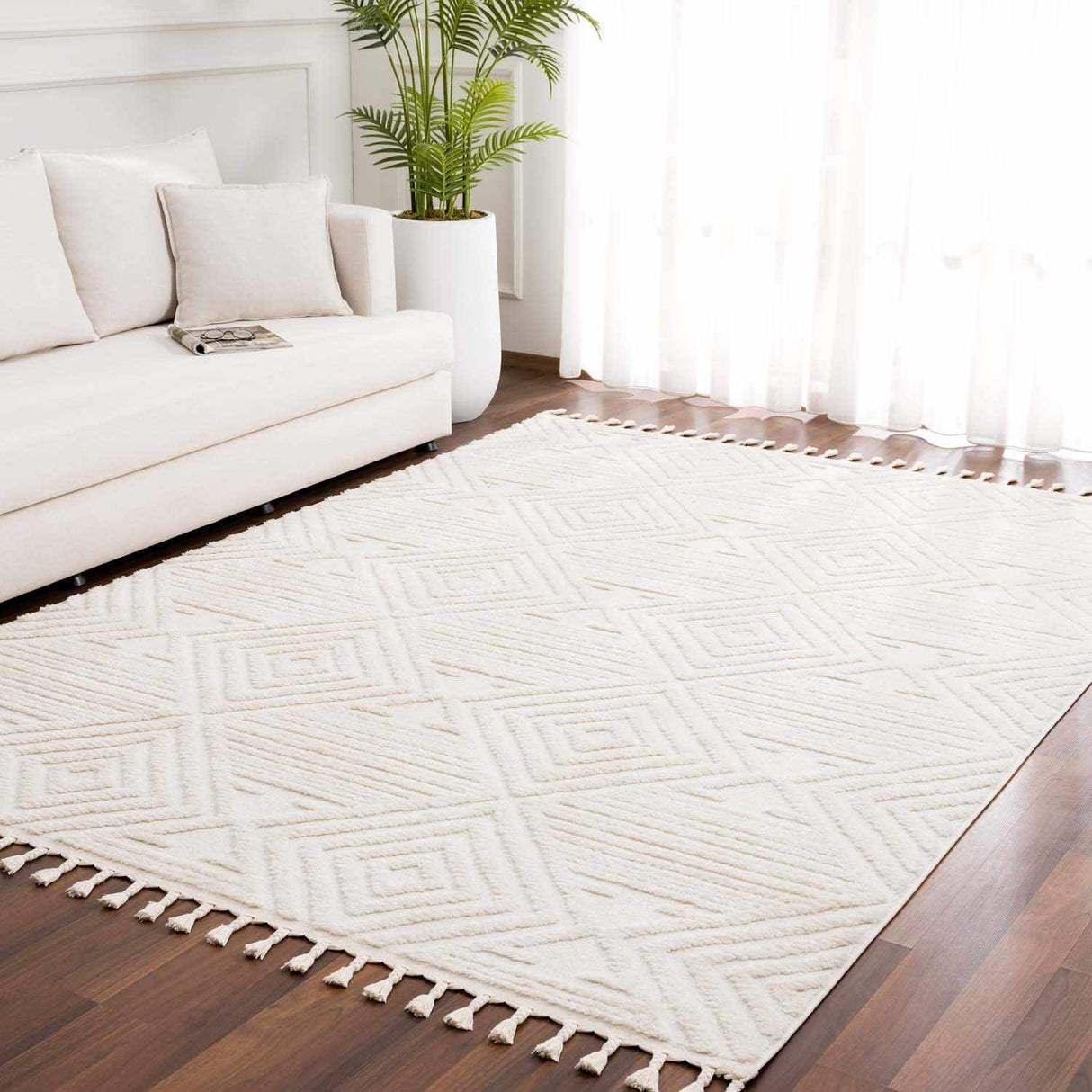 Manyas 3D Bone Area Rug with Tassels