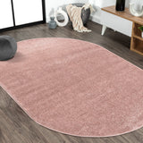 Haze Solid Unique Low-Pile Oval Area Rug