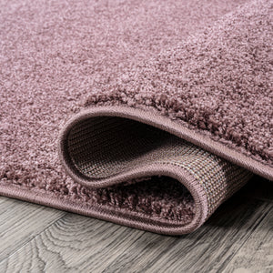 Haze Solid Unique Low-Pile Oval Area Rug