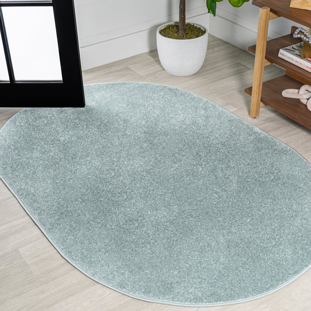 Haze Solid Unique Low-Pile Oval Area Rug
