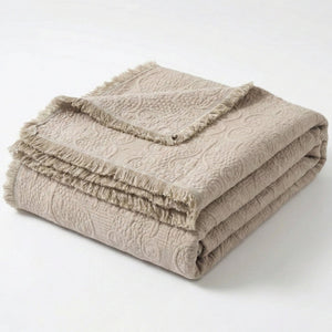 DaDa Bedding Elegant Fringed Cotton Quilted Throw Blanket - Luxurious Solid Soft Paisley Pattern, Cozy Lightweight Lap Throw, Perfect for Couch or Bed, Neutral Sandy Taupe Tan Beige, 50x60 Inches